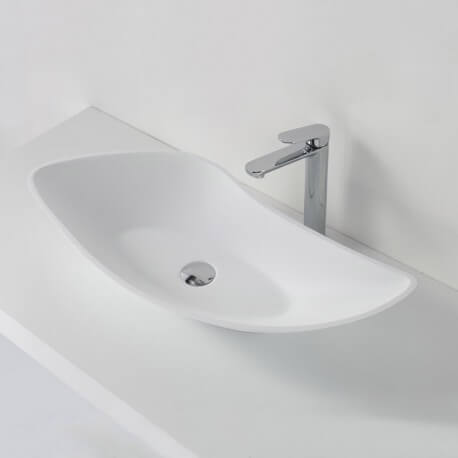 Large, asymmetrical composite landing basin