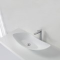 Large, asymmetrical composite landing basin