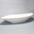 Large, asymmetrical composite landing basin