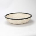 Round laying pan in beige and black stone Elegant