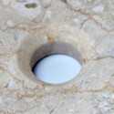 Telaio rotondo in pietra beige e nera Elegante
