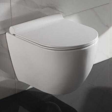 WC Suspendu Ovale - Céramique Blanc - Avec Abattant - Sans Bride - 49x36 cm - Cort | Rue du Bain